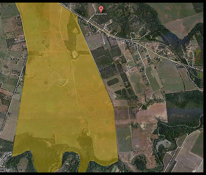 Satellite view with the ~1,000-acre Mission Rail Park property outlined, County Road 128 along its northern edge and the Union Pacific line beyond