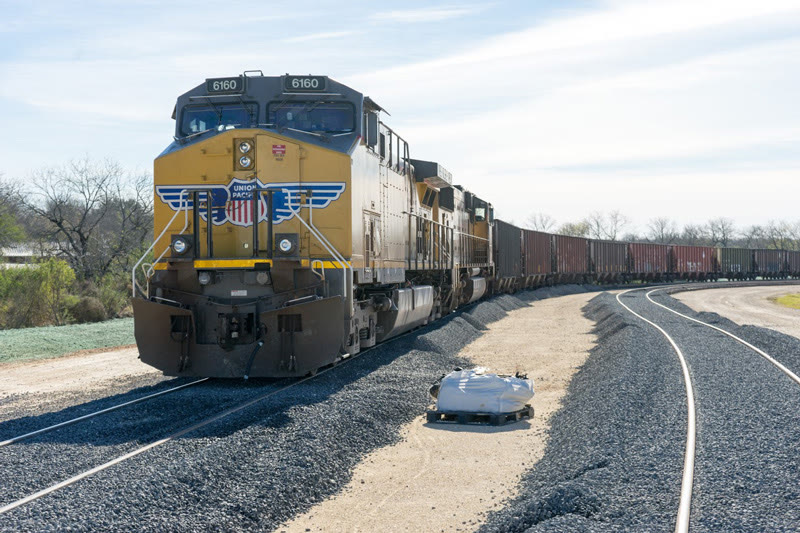 Union Pacific locomotives leading a train onto new track at Mission Rail Park
